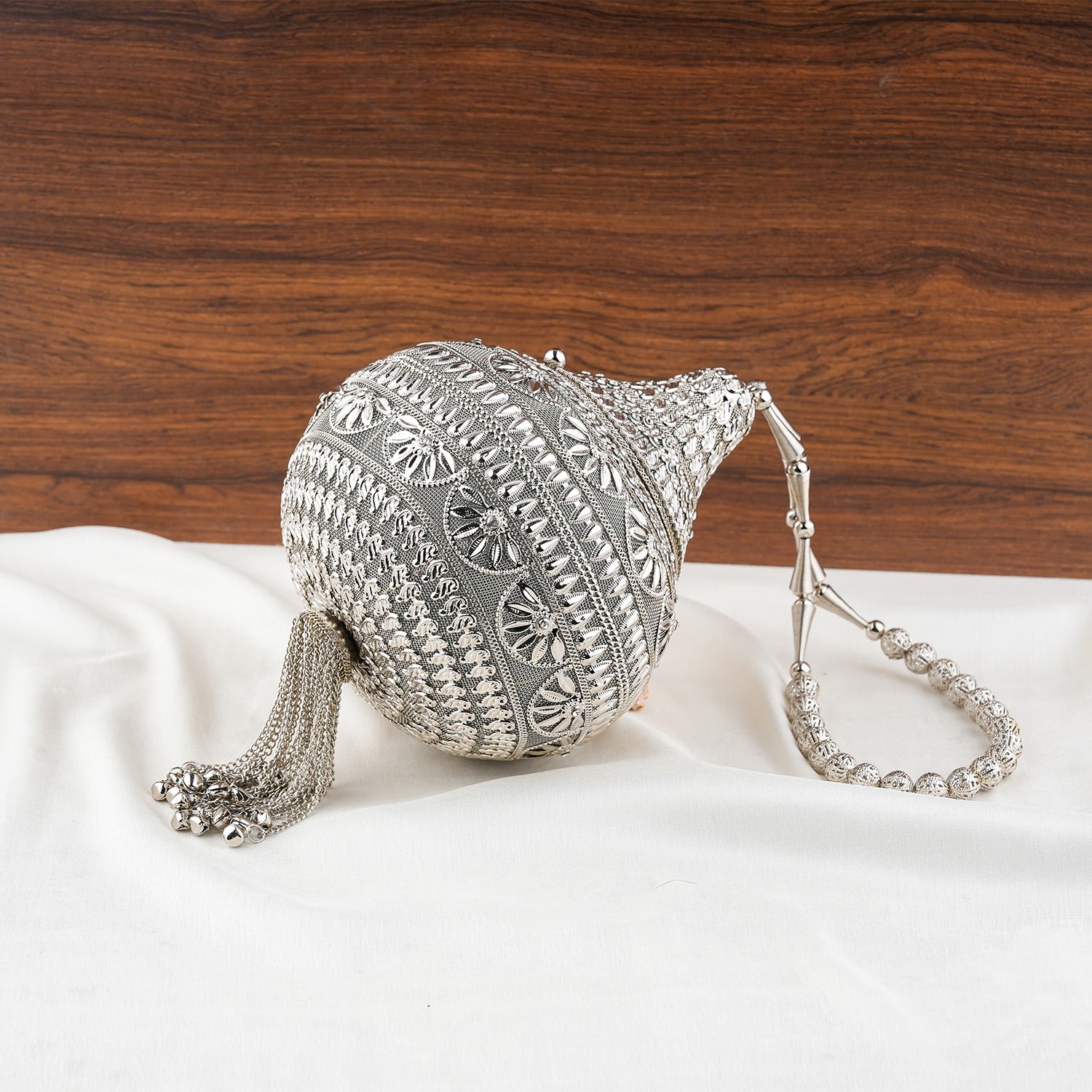 Silver Embellished Shankh Shaped Potli Clutch