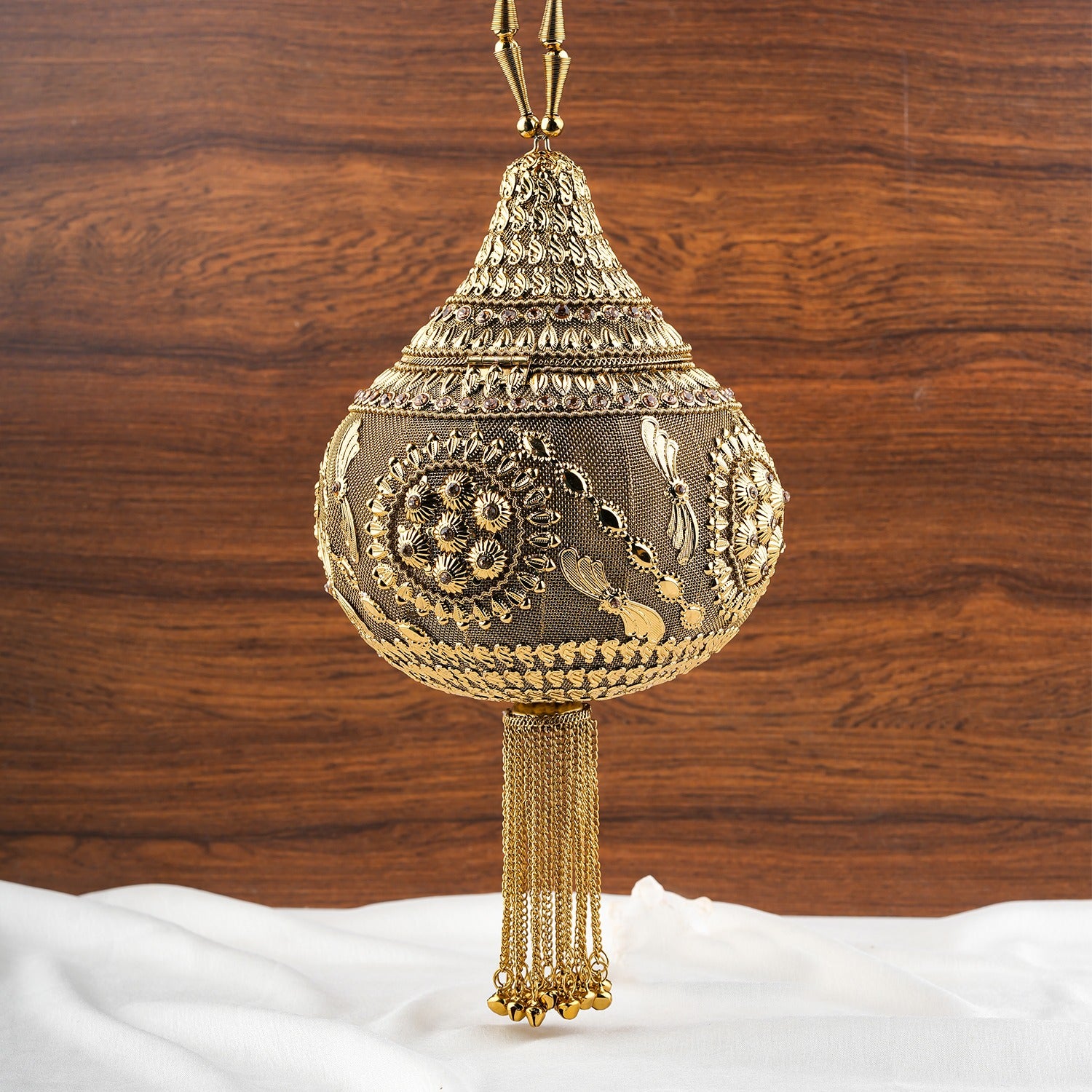 Royal Shankh Shape Golden Handheld Clutch
