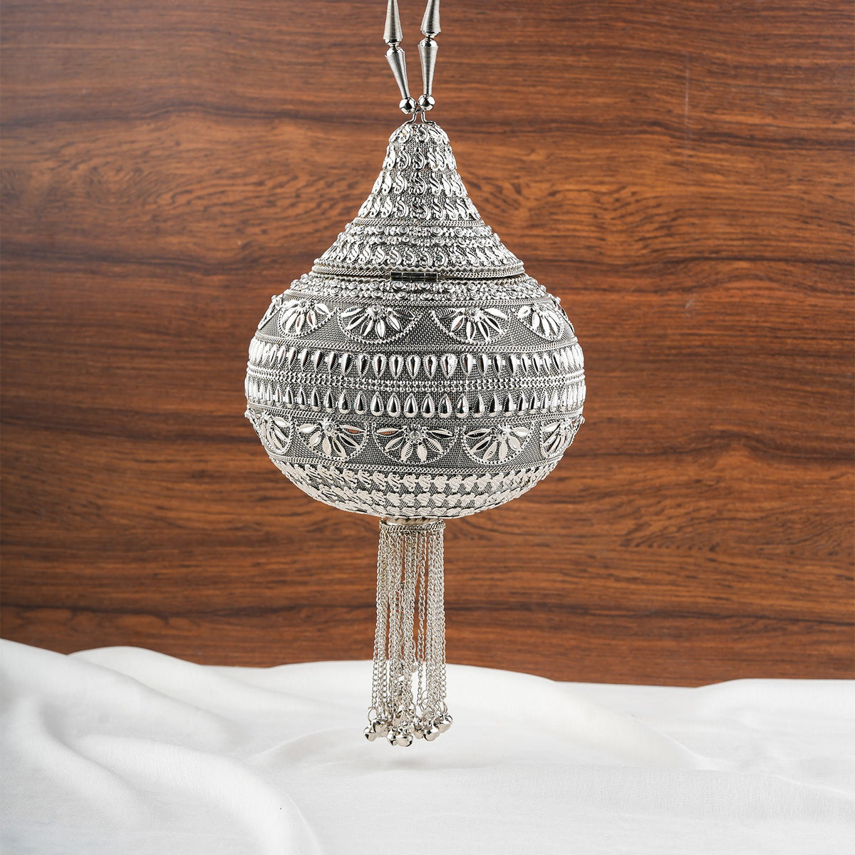 Silver Embellished Shankh Shaped Potli Clutch